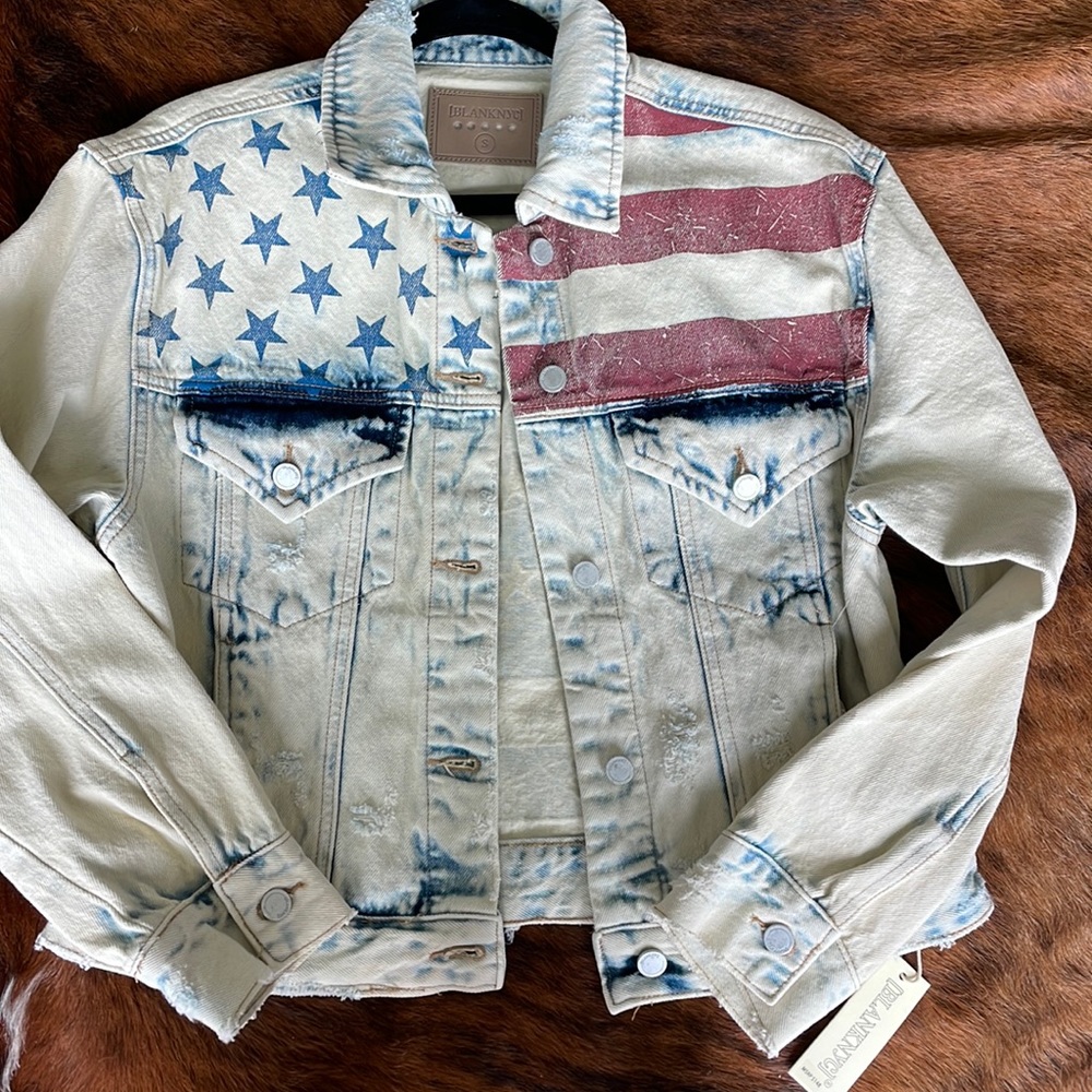 Small distressed denim jacket in Stars and Stripes flag, America icon. New.